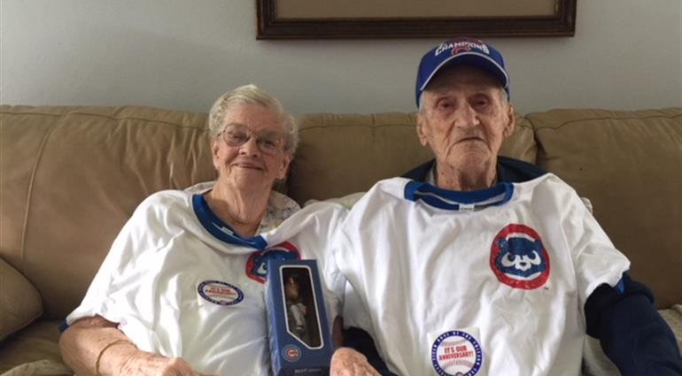 Couple wearing Cubs gear